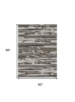 5' X 8' Gray and Ivory Abstract Power Loom Distressed Area Rug