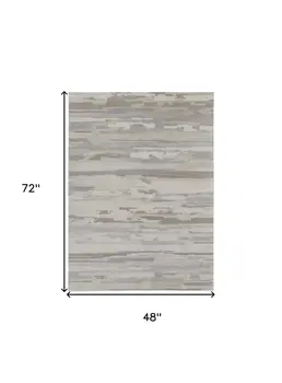 4' X 6' Brown and Ivory Abstract Power Loom Distressed Area Rug