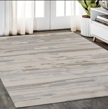 5' X 8' Brown and Ivory Abstract Power Loom Distressed Area Rug