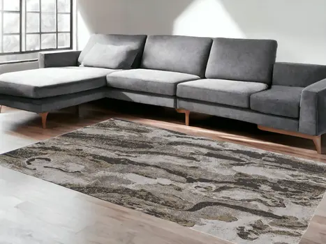 7' X 10' Brown and Ivory Abstract Power Loom Distressed Area Rug