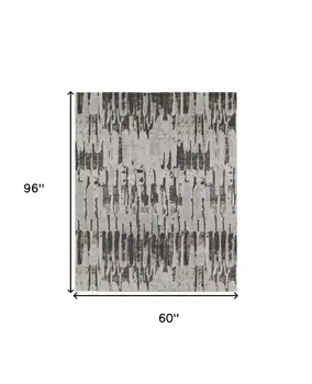 5' X 8' Gray and Ivory Abstract Power Loom Area Rug