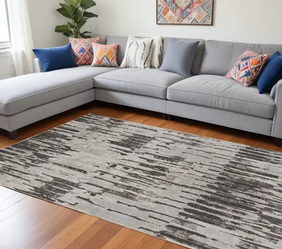 8' X 10' Gray and Ivory Abstract Power Loom Area Rug