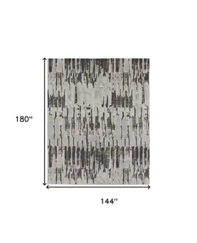 12' X 15' Ivory Brown And Gray Abstract Power Loom Stain Resistant Area Rug