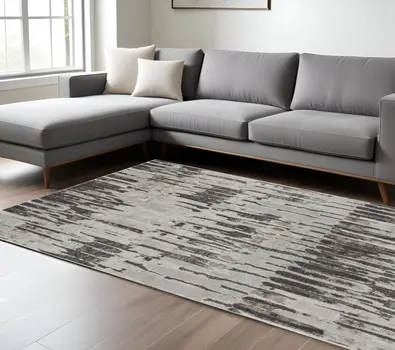 12' X 15' Ivory Brown And Gray Abstract Power Loom Stain Resistant Area Rug