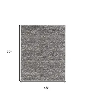 4' X 6' Gray and Ivory Abstract Power Loom Area Rug