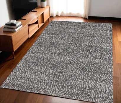 5' X 8' Gray and Ivory Abstract Power Loom Area Rug