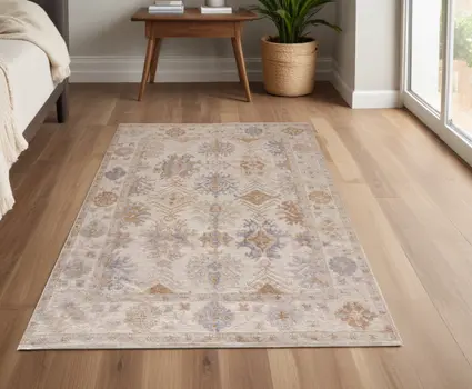 4' X 6' Beige and Brown Floral Hand Knotted Area Rug