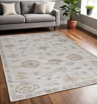 5' X 8' Orange and Ivory Floral Hand Knotted Area Rug