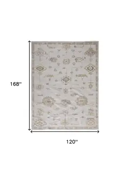 10' X 14' Ivory And Orange Floral Hand Knotted Stain Resistant Area Rug