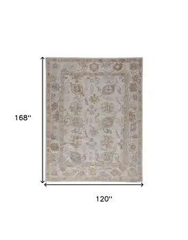 10' X 14' Ivory And Tan Floral Hand Knotted Stain Resistant Area Rug
