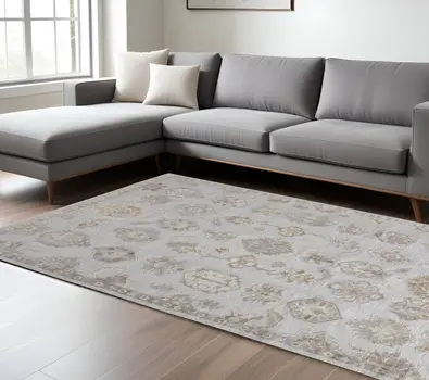 8' X 10' Ivory Silver And Tan Floral Hand Knotted Stain Resistant Area Rug