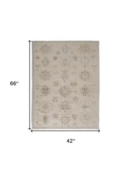 4' X 6' Tan and Brown Floral Hand Knotted Area Rug