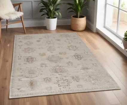 4' X 6' Tan and Brown Floral Hand Knotted Area Rug
