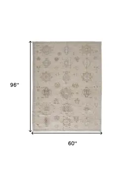 5' X 8' Tan And Brown Floral Hand Knotted Stain Resistant Area Rug