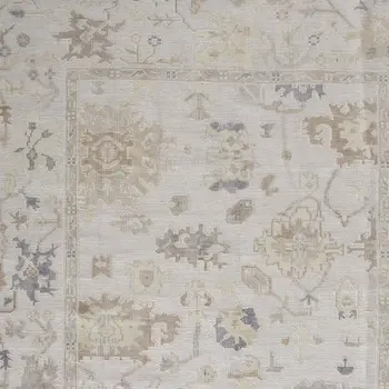 8' X 10' Tan Ivory And Orange Floral Hand Knotted Stain Resistant Area Rug