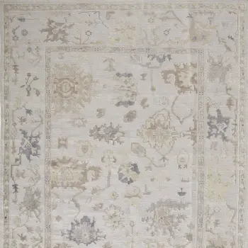 8' X 10' Tan Ivory And Orange Floral Hand Knotted Stain Resistant Area Rug