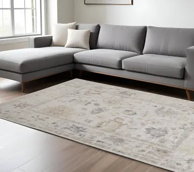 9' X 12' Tan Ivory And Orange Floral Hand Knotted Stain Resistant Area Rug