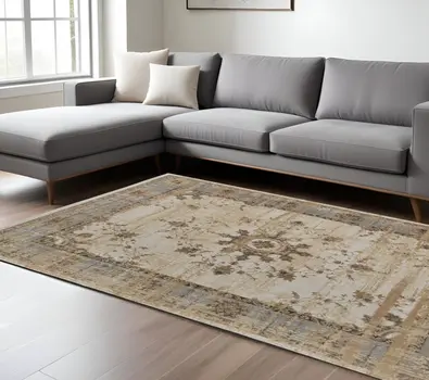10' X 14' Tan Brown And Gray Power Loom Distressed Area Rug