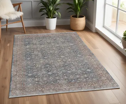 4' X 6' Blue and Beige Floral Power Loom Area Rug
