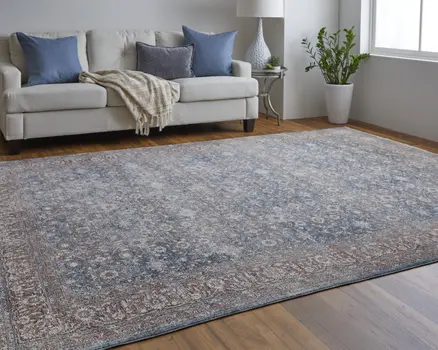 4' X 6' Blue and Beige Floral Power Loom Area Rug