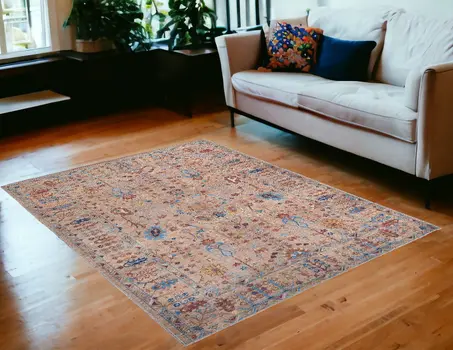 5' X 8' Tan Pink And Blue Floral Power Loom Area Rug