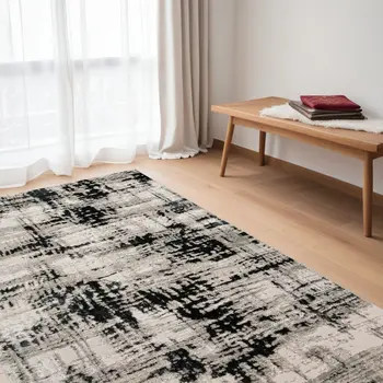 5' X 8' Black White And Gray Stain Resistant Area Rug