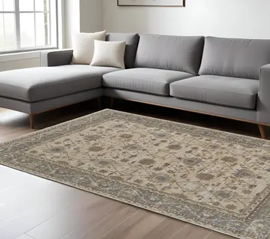 8' X 10' Tan Ivory And Gray Power Loom Area Rug