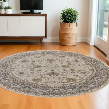 8' Brown and Ivory Round Oriental Power Loom Distressed Area Rug