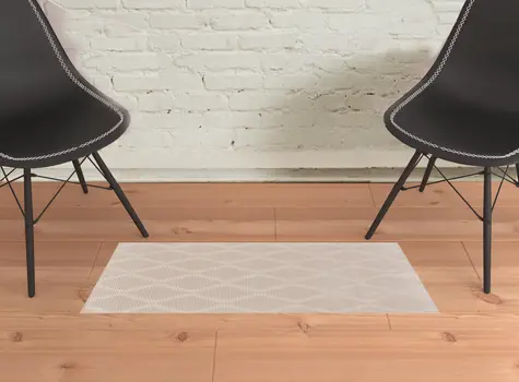 2' X 3' Ivory And Tan Geometric Stain Resistant Area Rug