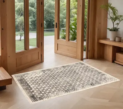 2' X 3' Ivory Black And Taupe Abstract Stain Resistant Area Rug
