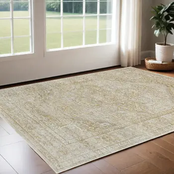 2' X 3' Ivory And Gold Floral Stain Resistant Area Rug