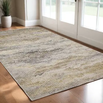 2' X 3' Gold Gray And Ivory Abstract Stain Resistant Area Rug