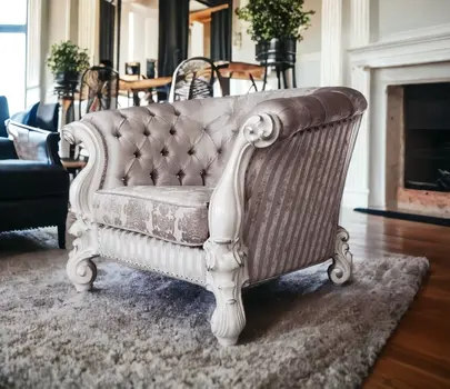 52" Ivory and Bone Fabric Damask Tufted Chesterfield Chair And Toss Pillows