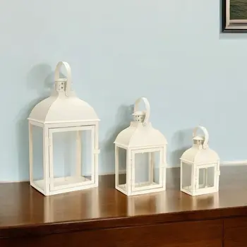 Set of Three Ivory Distressed Glass And Metal Floor Lantern Candle Holders