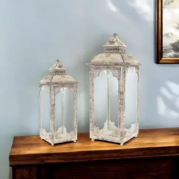 Set of Two Beige Distressed Ornate Glass And Metal Floor Lantern Candle Holders