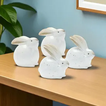 Set of Four White And Brown Terracotta Rabbit Figurines
