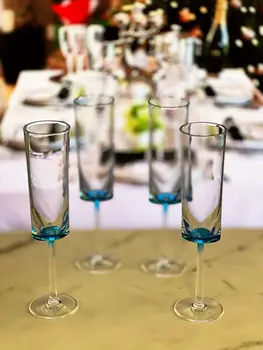 Set of Four Clear and Blue Acrylic Stemmed Flutes