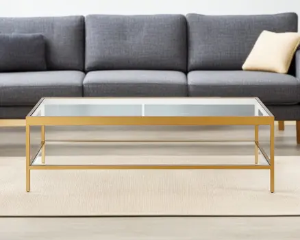 54" Clear And Gold Glass And Steel Coffee Table With Shelf
