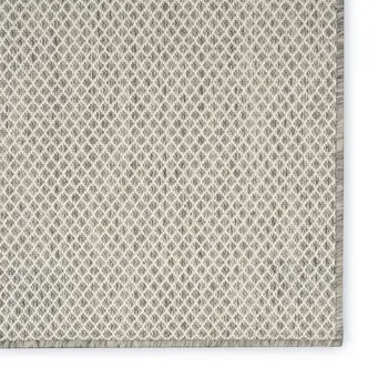 7' X 10' Ivory And Silver Indoor Outdoor Area Rug