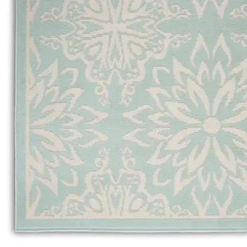 5' X 7' Blue and Ivory Floral Medallion Power Loom Area Rug