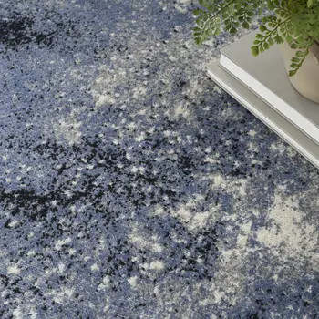 5' X 7' Blue And Black Abstract Area Rug