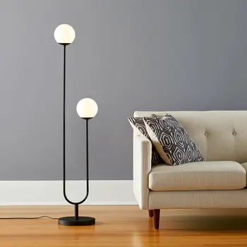 69" Black Two Light Novelty Floor Lamp With White Frosted Glass Globe Shade