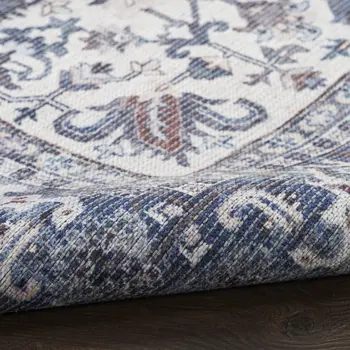 5' X 7' Gray Ivory and Blue Floral Power Loom Distressed Washable Area Rug