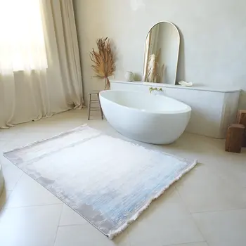 9' X 12' Beige and Blue Abstract Washable Non Skid Area Rug