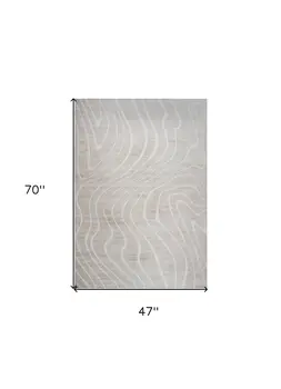4' X 6' Beige and Ivory Abstract Distressed Area Rug