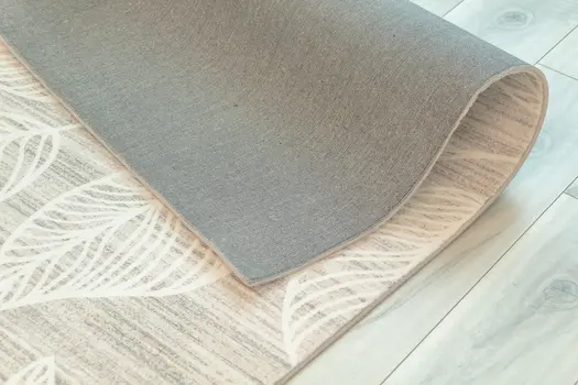 7' X 10' Beige and Ivory Floral Distressed Area Rug