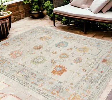 8' X 10' Blue and Orange Floral Stain Resistant Indoor Outdoor Area Rug