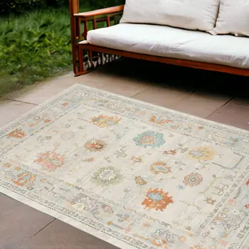 9' X 12' Blue and Orange Floral Stain Resistant Indoor Outdoor Area Rug