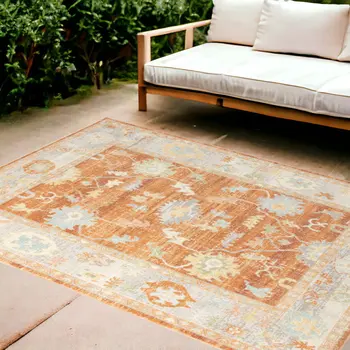 8' X 10' Blue and Orange Floral Stain Resistant Indoor Outdoor Area Rug