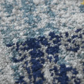 5' X 7' Blue and Orange Abstract Power Loom Area Rug